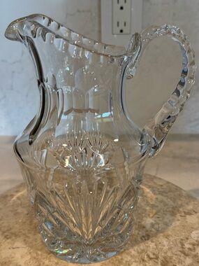 Vintage Gorham cut glass crystal pitcher, often featuring a fan or star design
